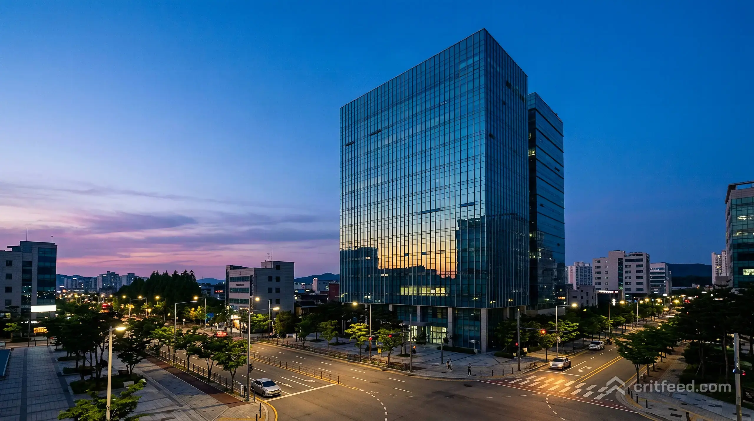 a wide shot of a modern office tower in Seongnam at dusk, glass facade reflecting street lights, no visible signage